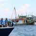 Ilustrasi mantan Menteri KKP Susi Pudjiastuti menenggelamkan Kapal Pencuri Ikan. (Jessica Helena Wuysang /ANTARA FOTO)